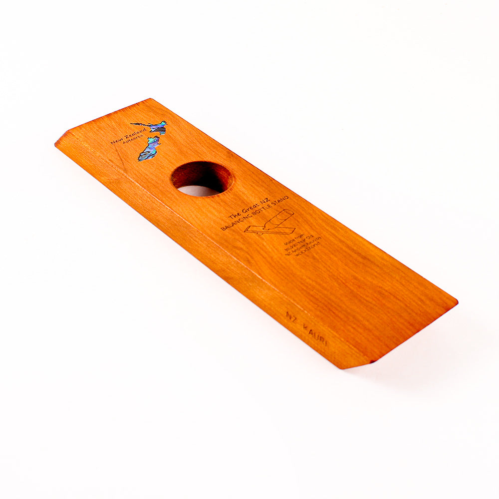 The Great NZ Balancing Bottle Stand, Ancient Kauri with Paua NZ Map